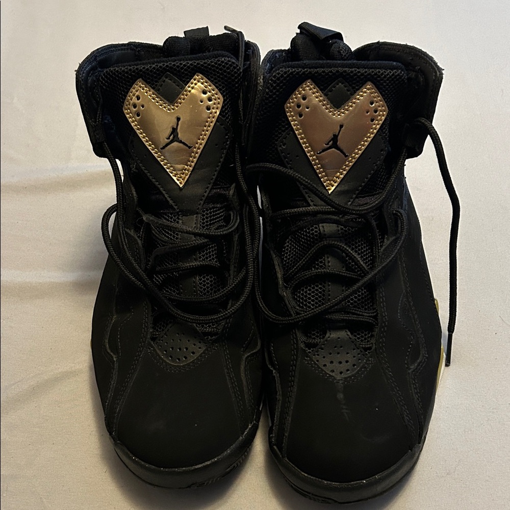 Jordan Black and Gold Sneakers go fly